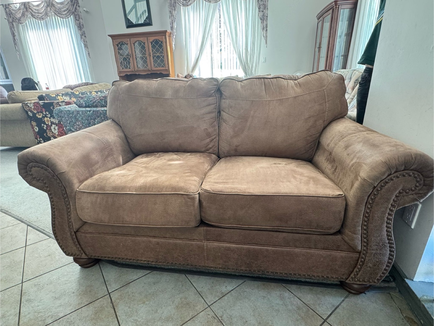 Brown loveseat