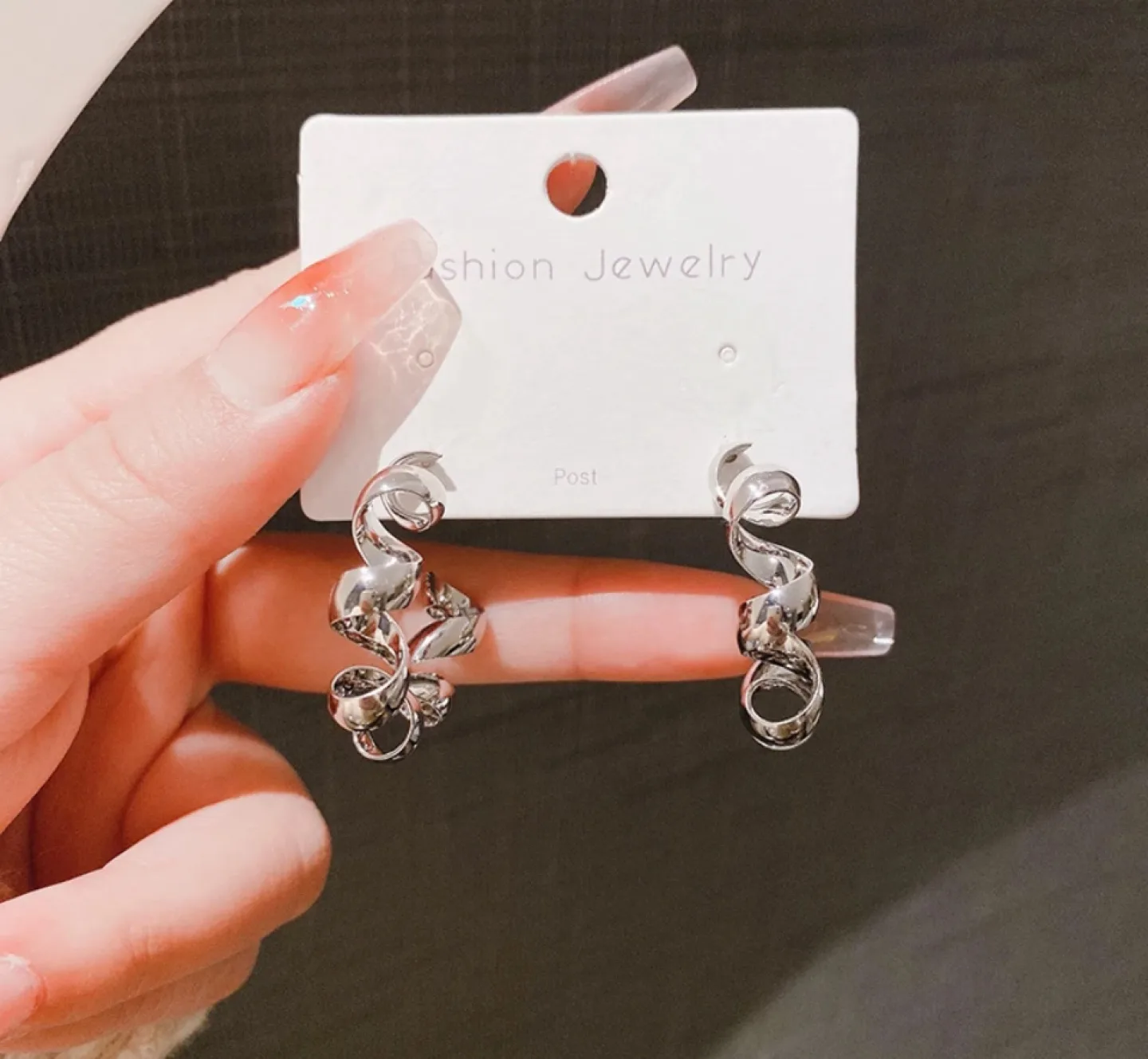 Brand new 3 pairs Star and Swirl Earrings Bundle image indicator(5)