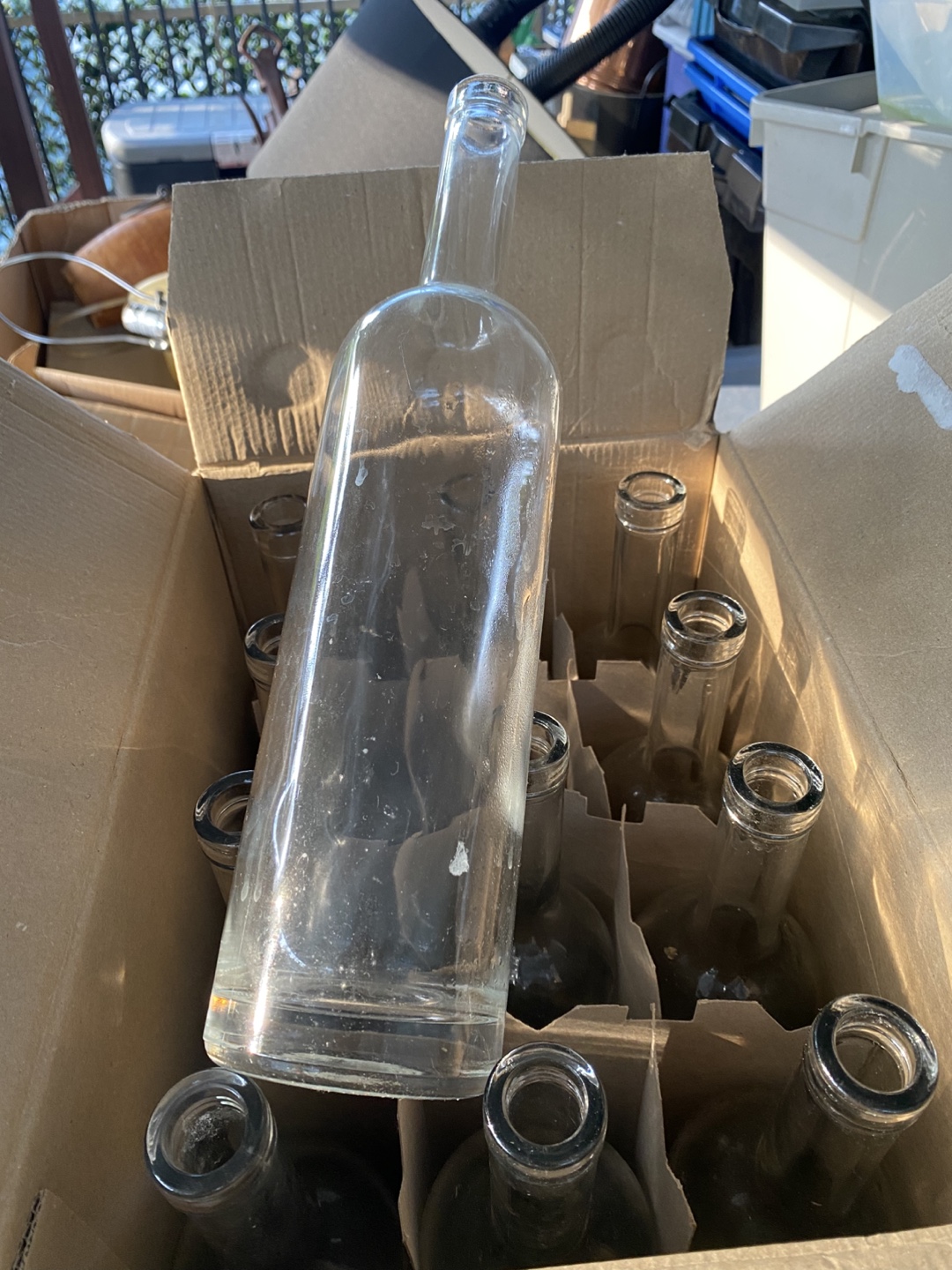 12 Empty Glass Wine Bottles with Caps. Each box $12