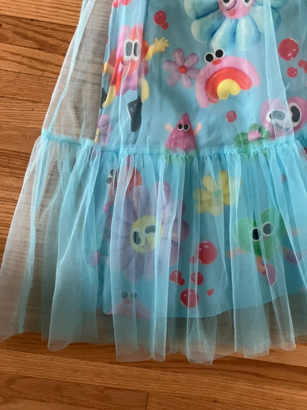 Adorable Girls' Character Print Dress with Tulle Overlay image indicator(3)