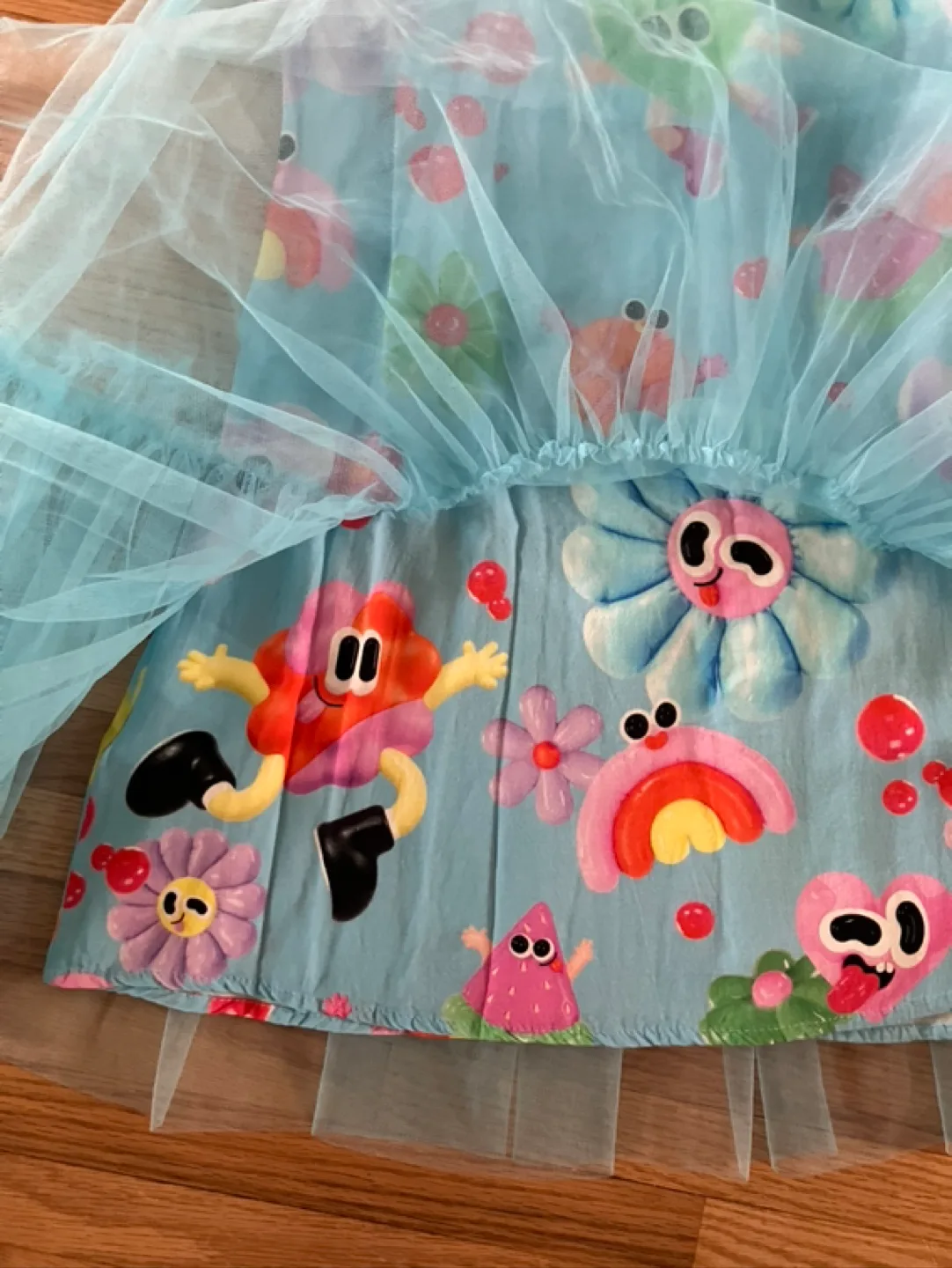 Adorable Girls' Character Print Dress with Tulle Overlay image indicator(5)