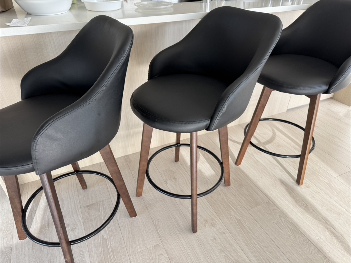 Set of Three Black Leather Bar Stools with Wood Legs