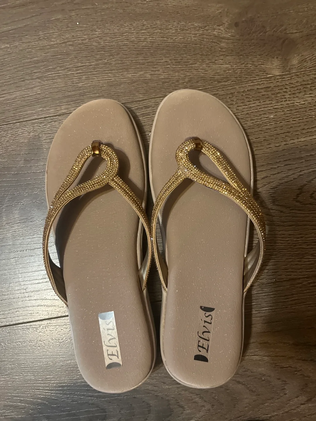 Rhinestone embellished beige flip flops