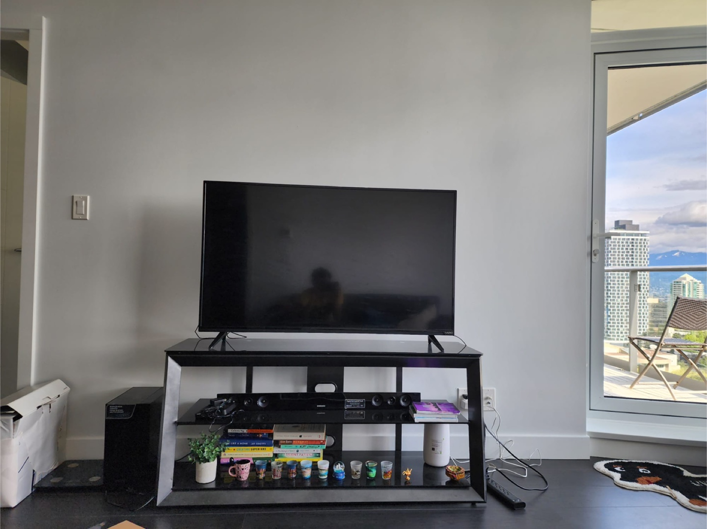 Glass Black TV Stand with TV and Sound System