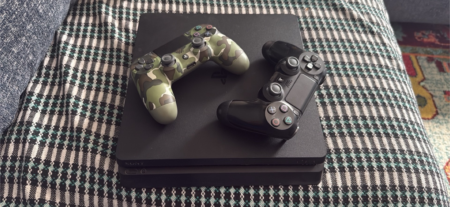 Sony PlayStation 4 with Two Controllers