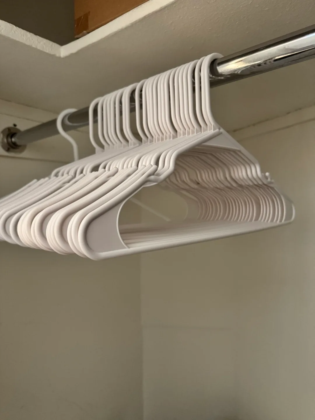 White Plastic Clothes Hangers thumbnail