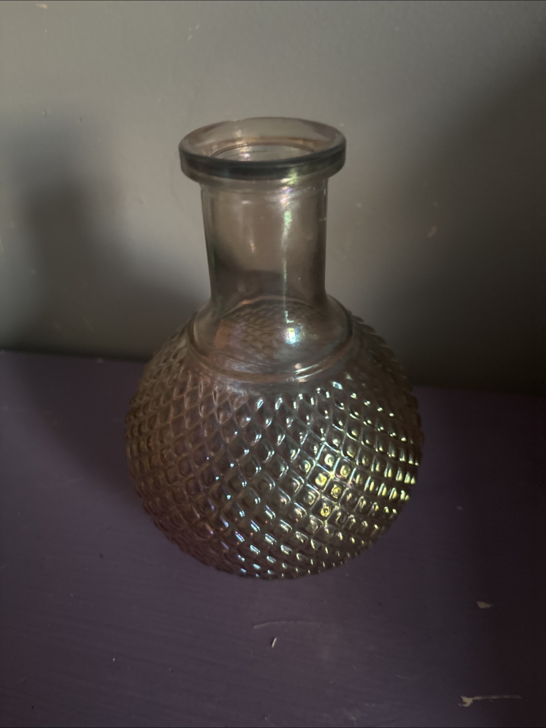 Vintage iridescent glass bottle