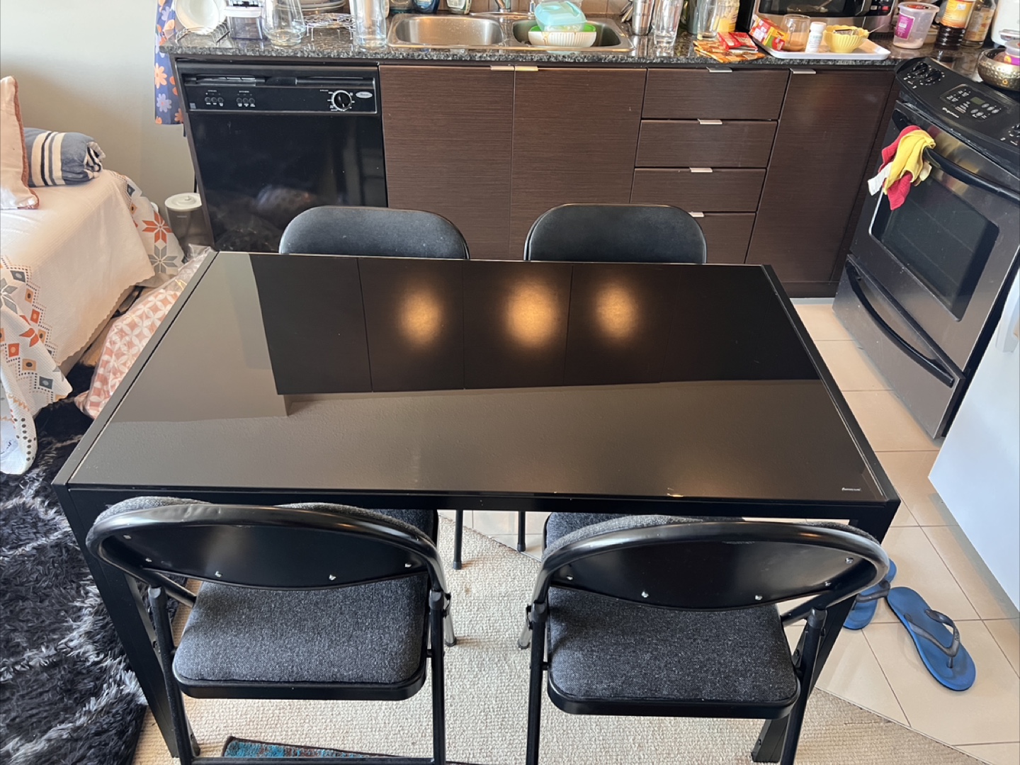 Black Glass Dining Table with Four Folding Chairs - photo 2