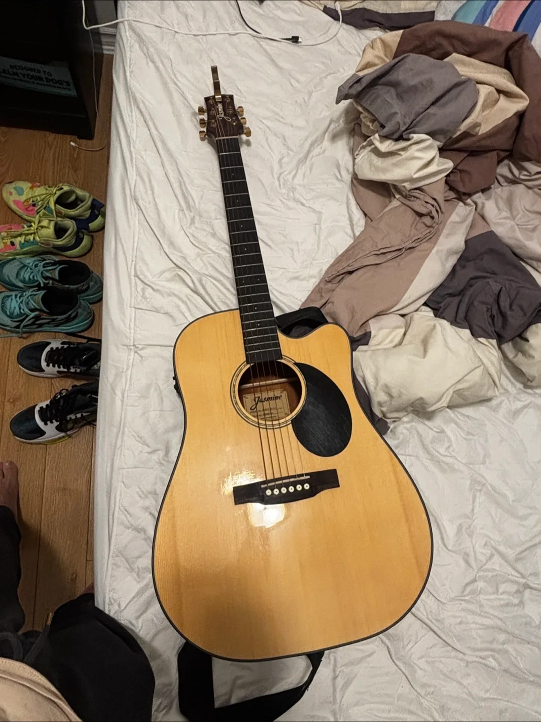 Jasmine Acoustic Guitar & Three Pairs of Basketball Shoes image indicator(4)