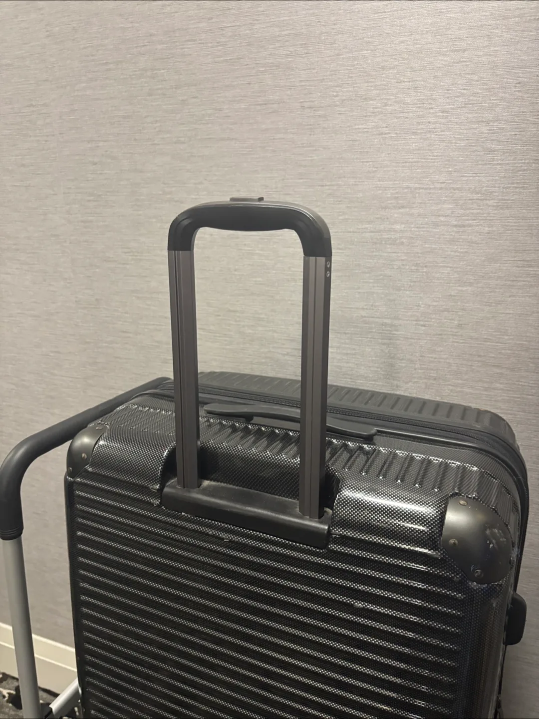 Large Black Suitcase with Wheels image indicator(3)