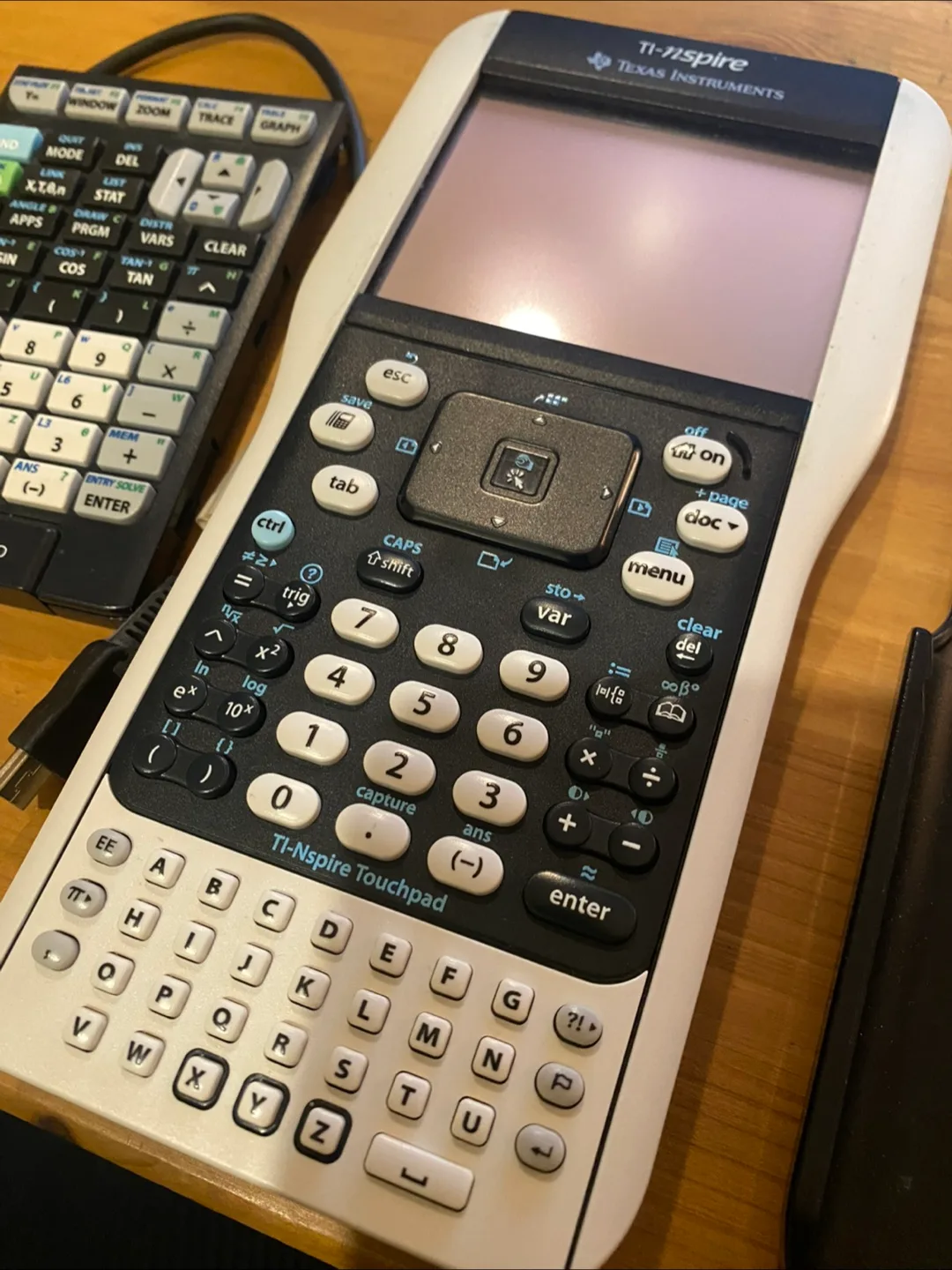 Texas Instruments TI-Nspire Calculator with TI-84 Plus keypad image indicator(3)