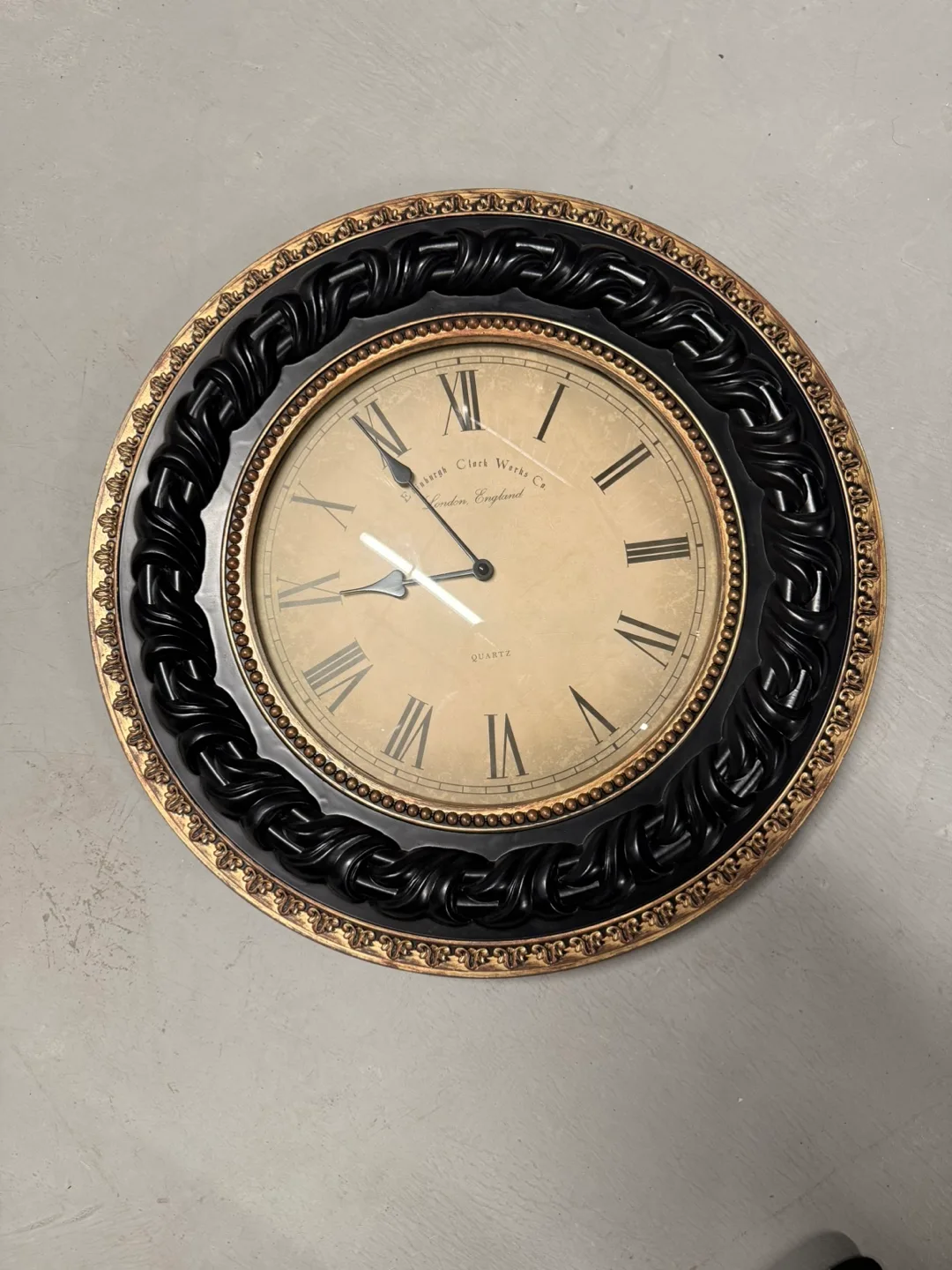 Elegant Black and Gold Wall Clock thumbnail