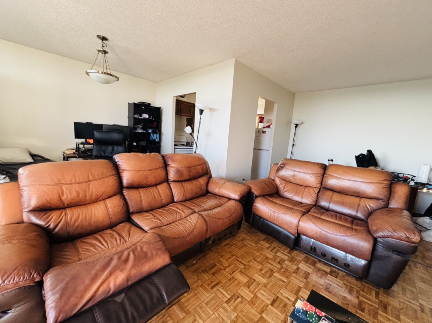 Reclining Leather Sofa and Loveseat Set