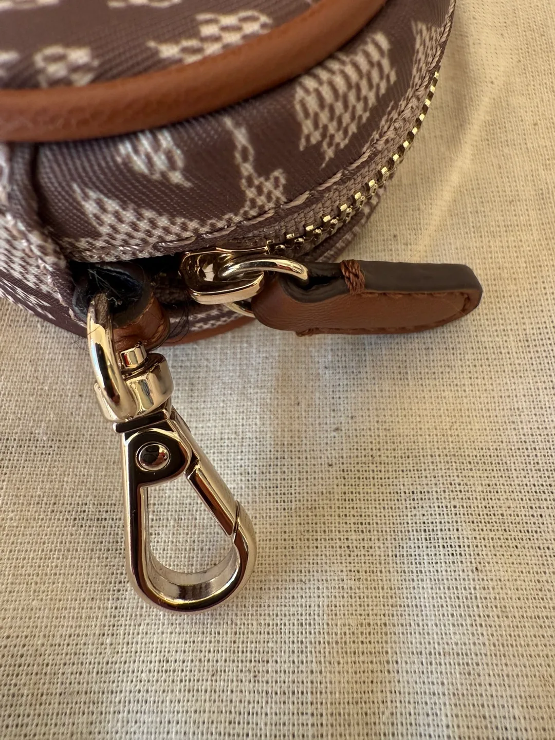 DKNY Oval-Shaped Zip Pouch with Carabiner (New) image indicator(5)