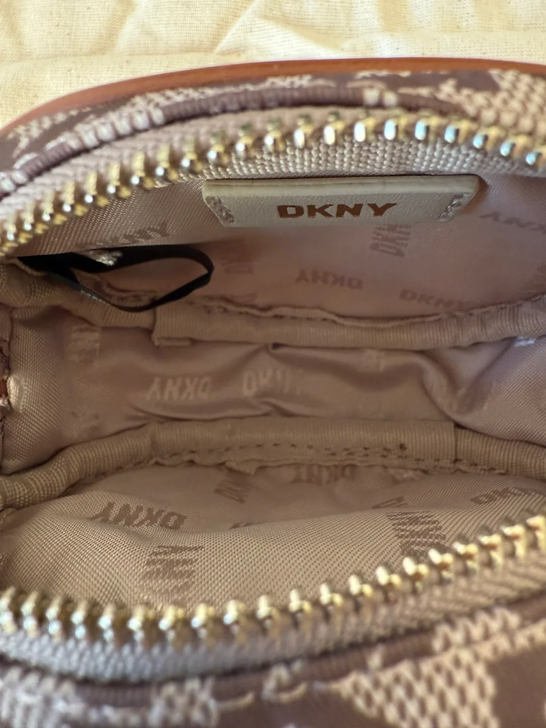 DKNY Oval-Shaped Zip Pouch with Carabiner (New) image indicator(8)