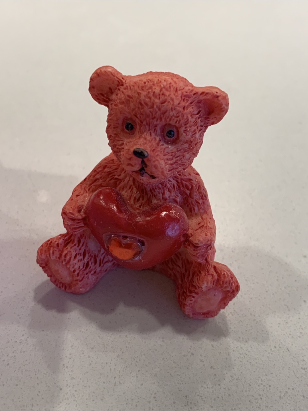 Adorable Red Teddy Bear Figurine with Heart