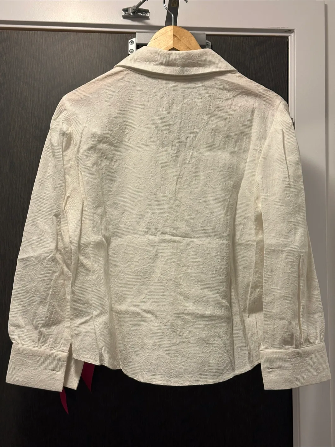 Cream-coloured collared button-up blouse image indicator(2)