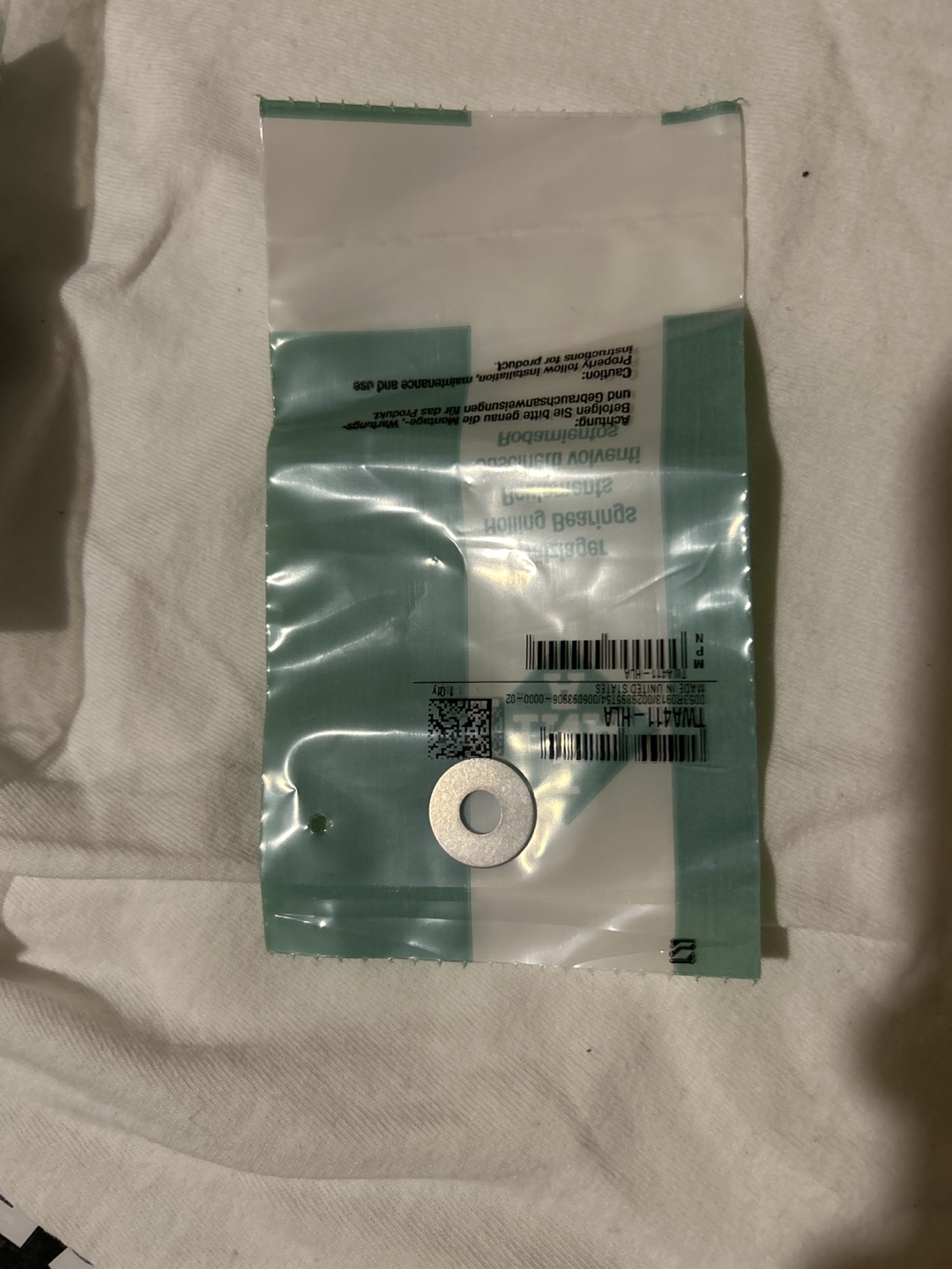 TWA411-HLA Washer (~1.7cm OD ~0.6cm ID)