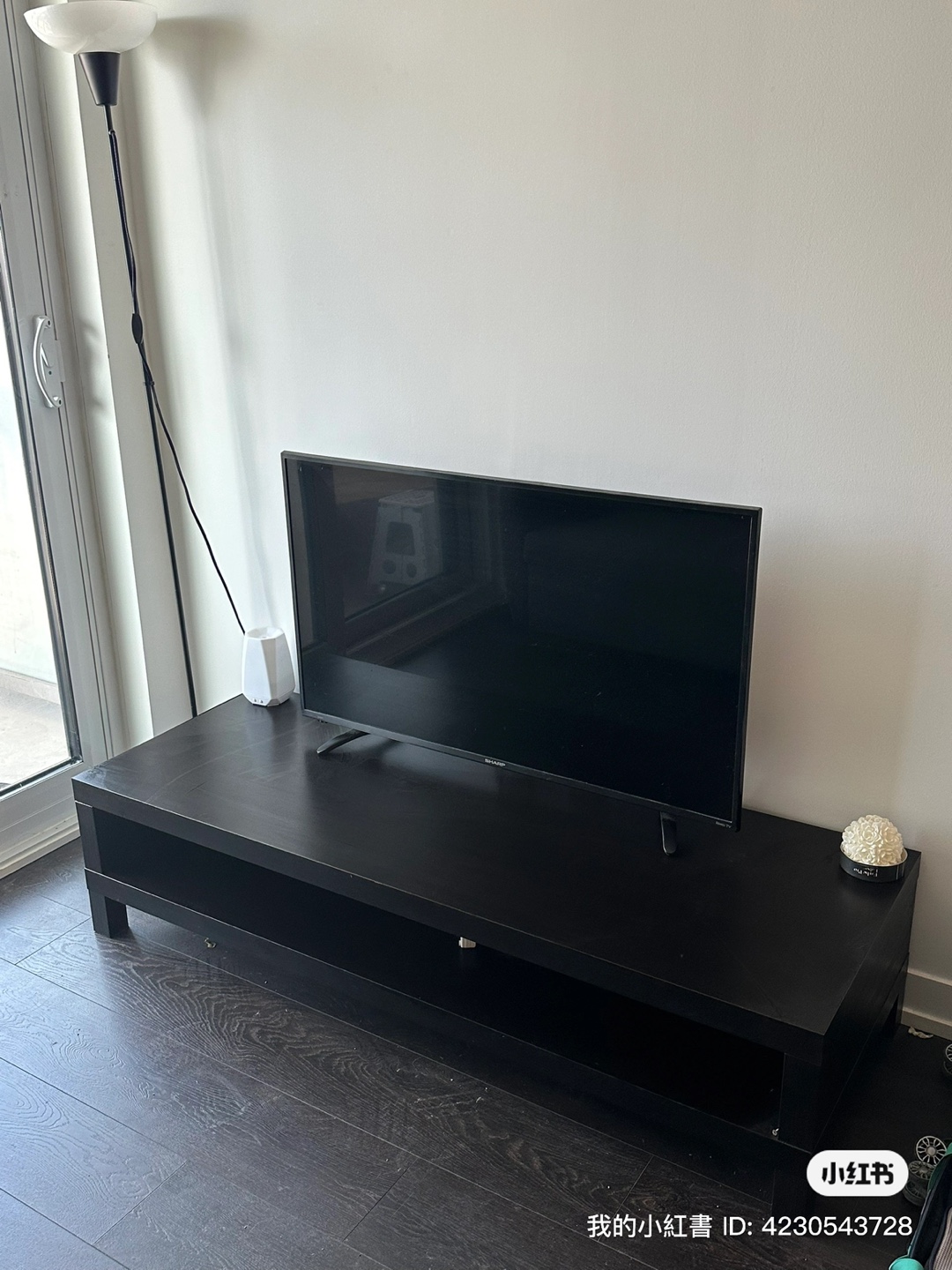 Sharp TV and Black TV Stand