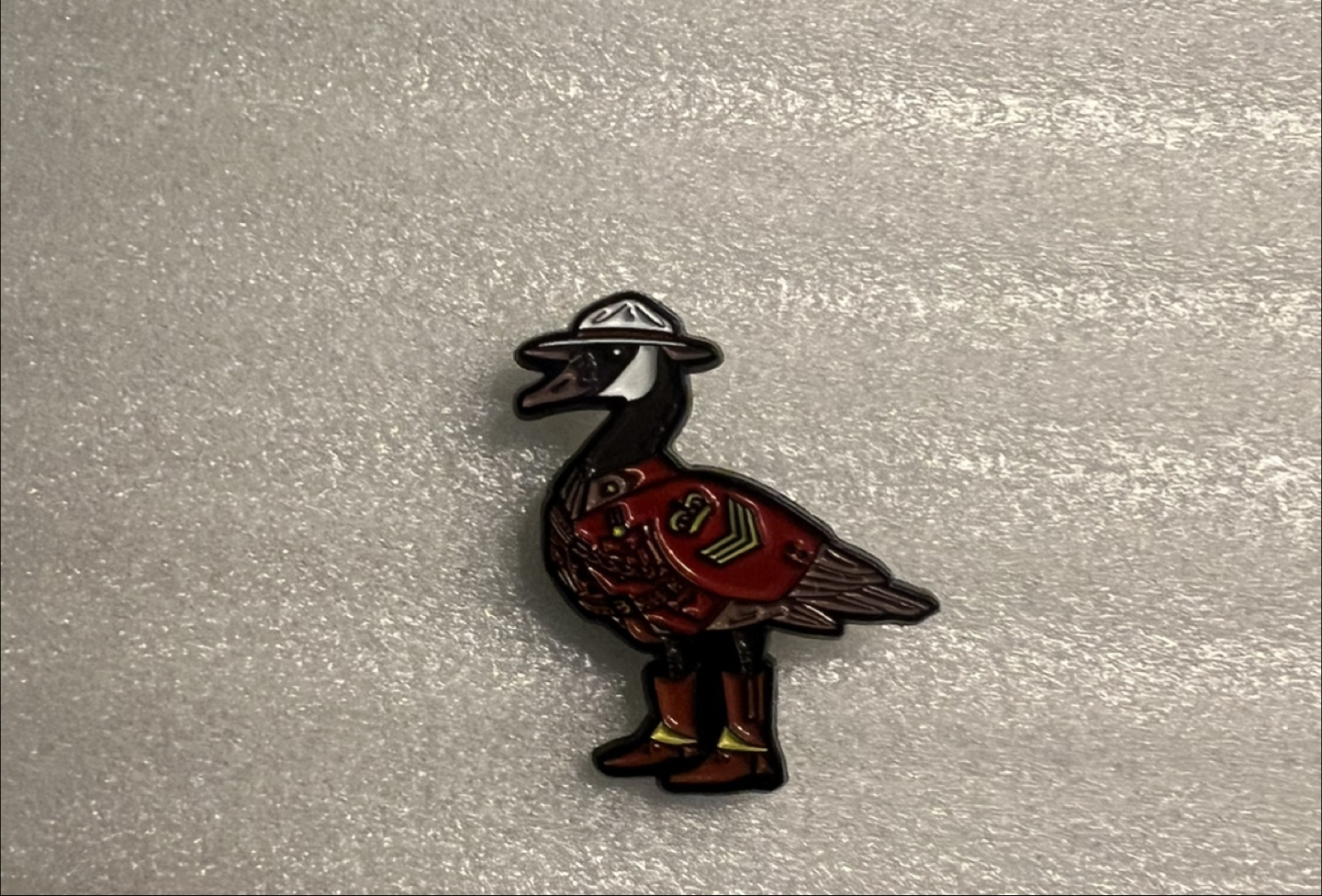 Goose Mountie enamel pin 🏒