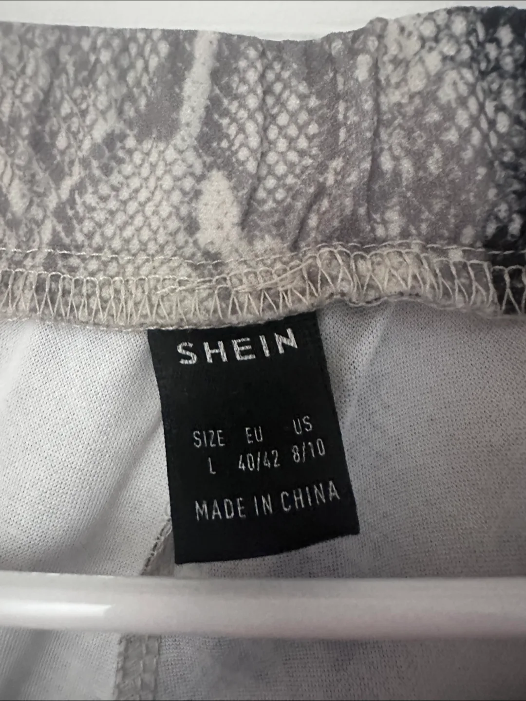 SHEIN Snakeskin Print Flare Pants Sz L image indicator(2)