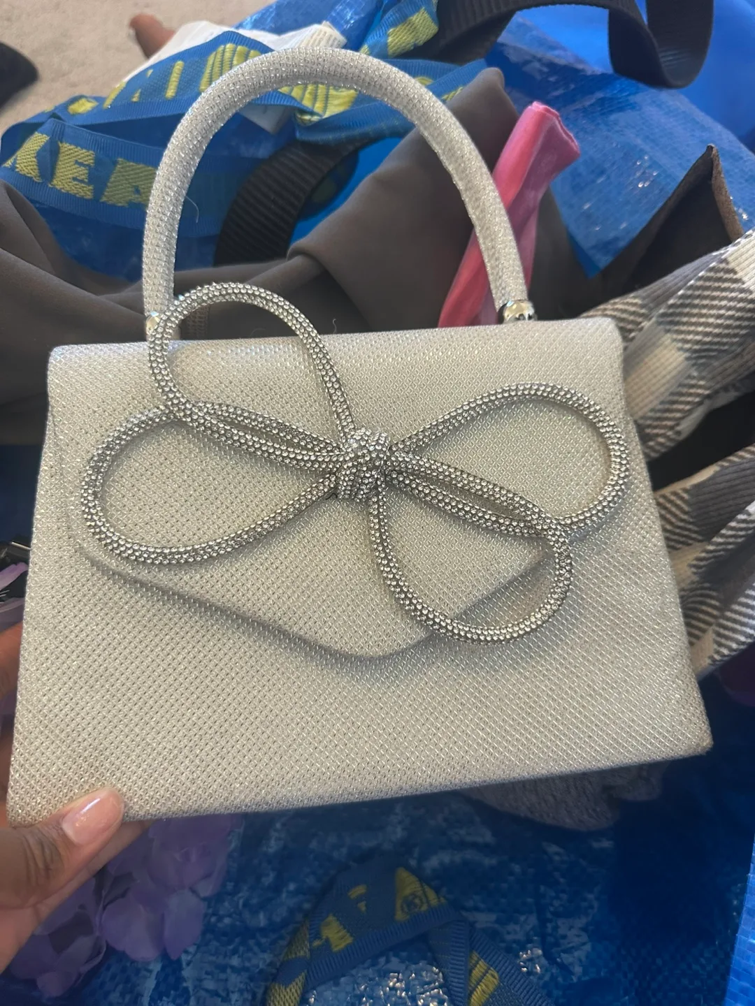 Silver sparkly clutch purse with bow detail🏒🏒🏒🏒 thumbnail