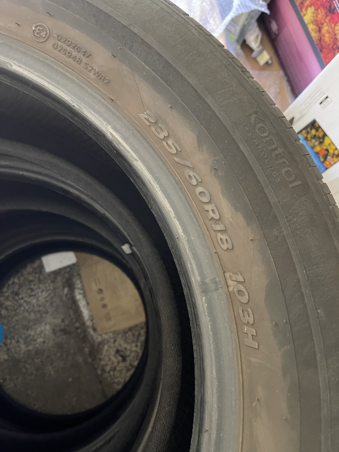 Used Hankook All-Season Tires - 235/60R18 103H - photo 2