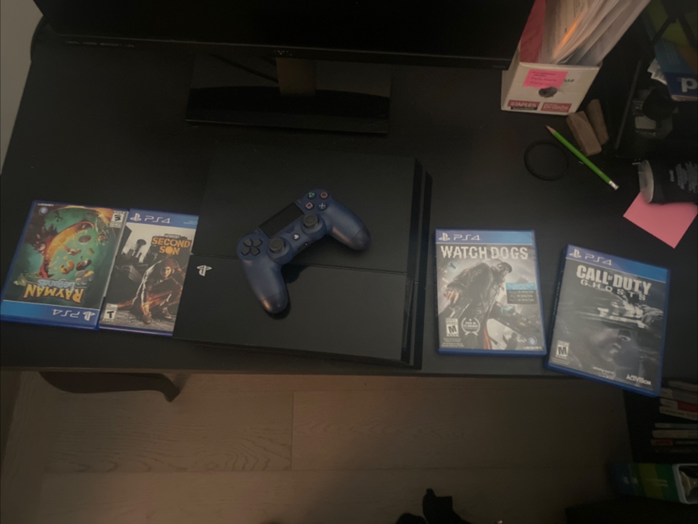 PS4 Console with 4 Games and Controller