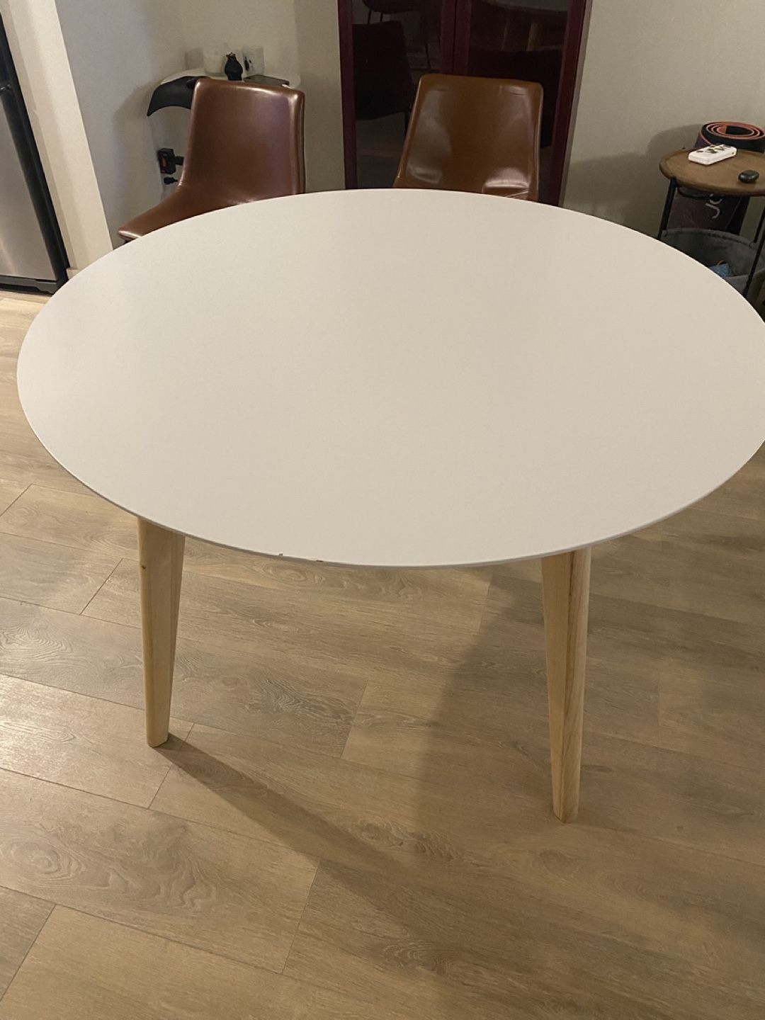 Round White Dining Table with Light Wood Legs - photo 2