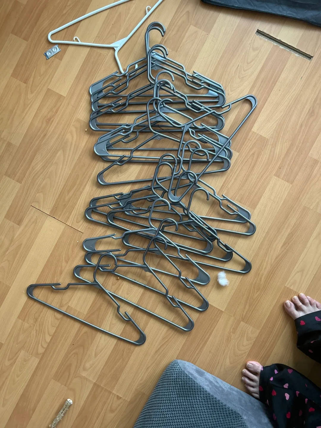 Bulk lot of grey plastic hangers thumbnail