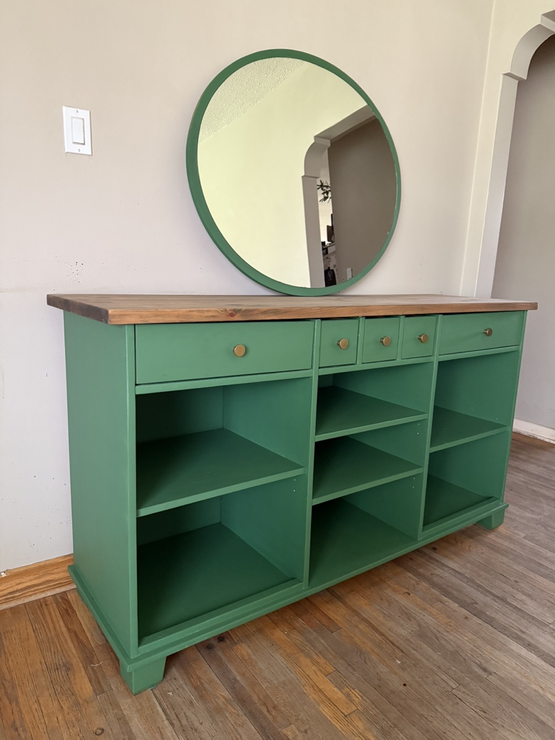 Custom-painted green console table with shelving and drawers - photo 3