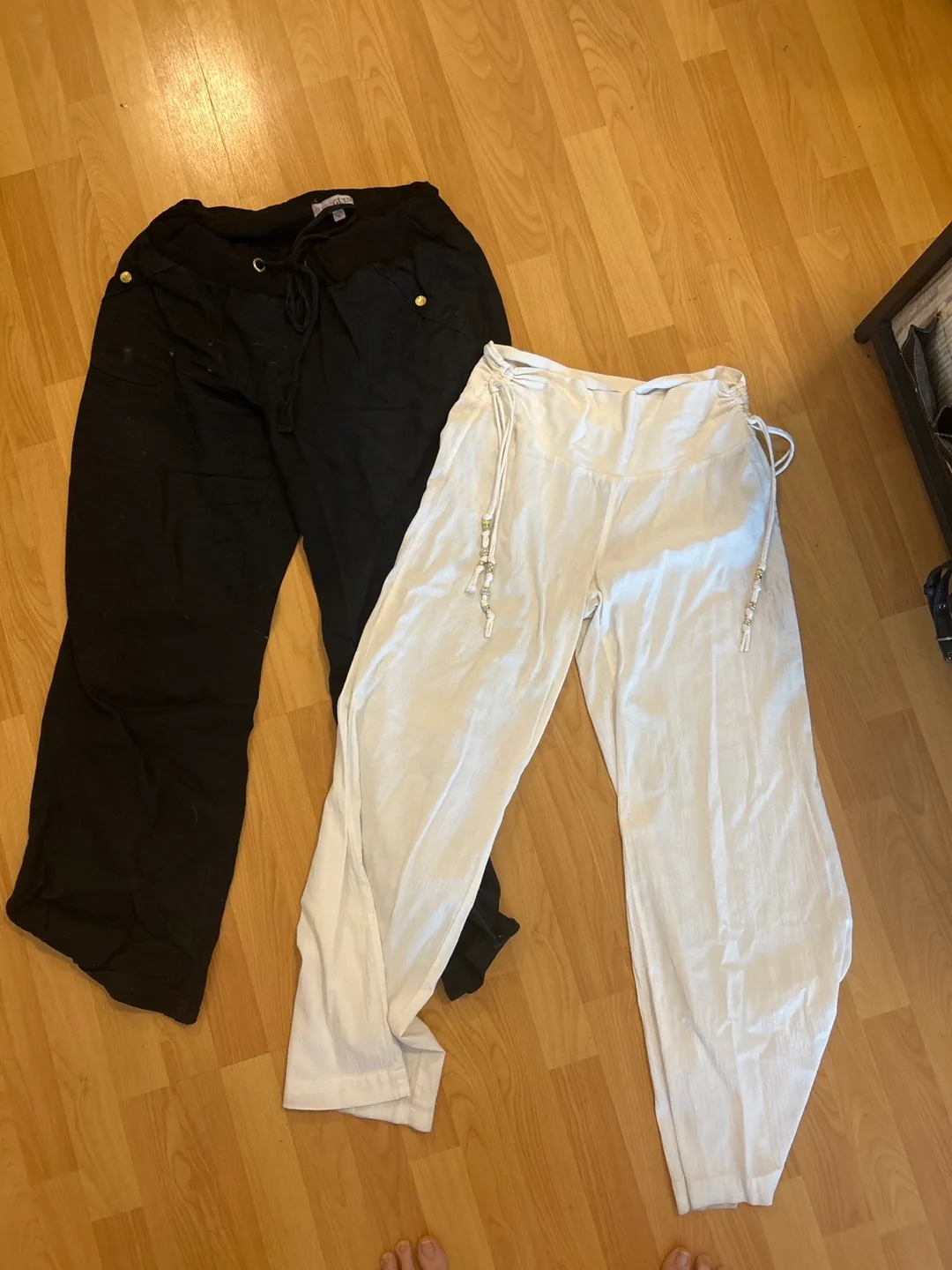 Two pairs of women's pants - black & white thumbnail