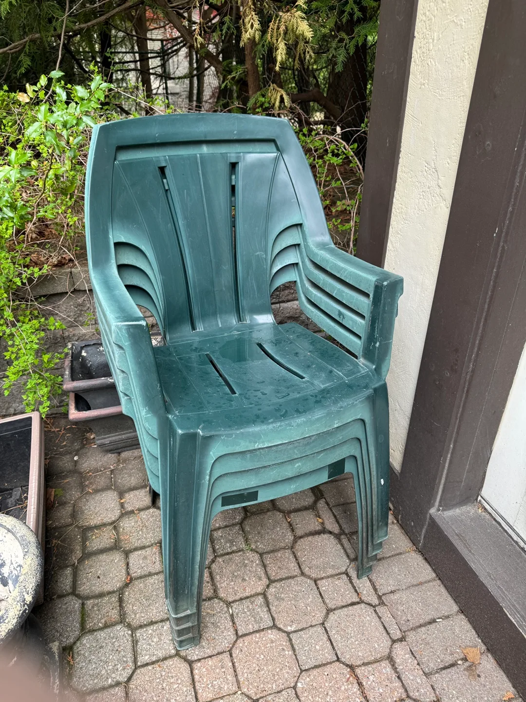 Four Green Plastic Stackable Outdoor Chairs thumbnail