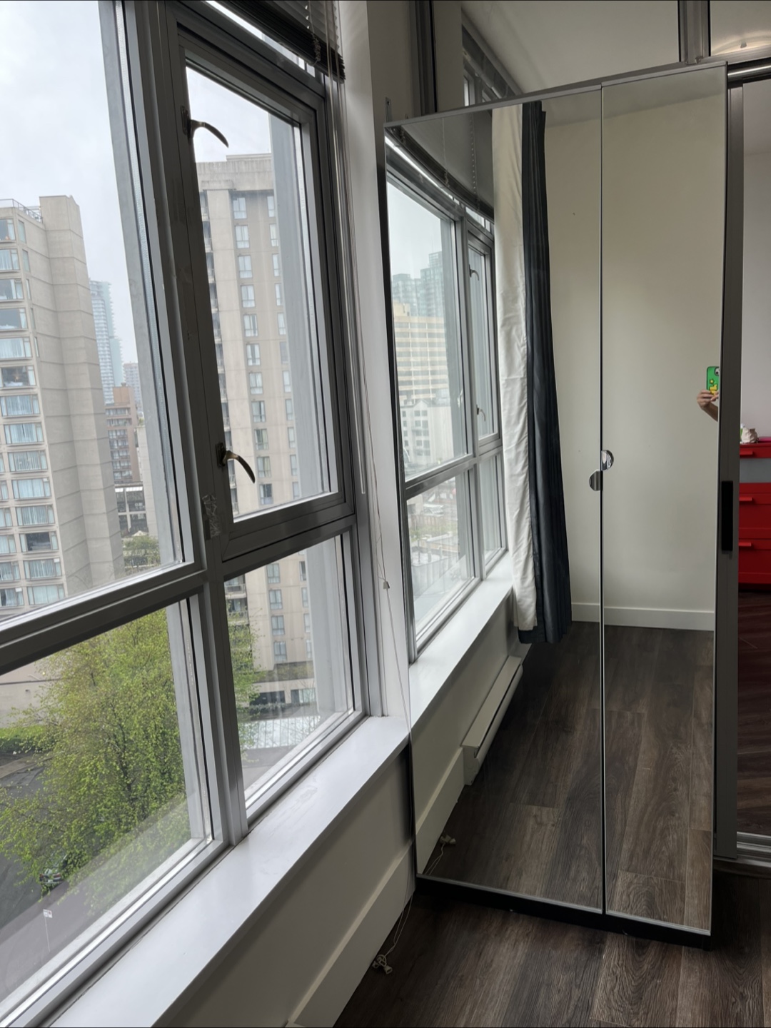 Closet with full-length mirror doors