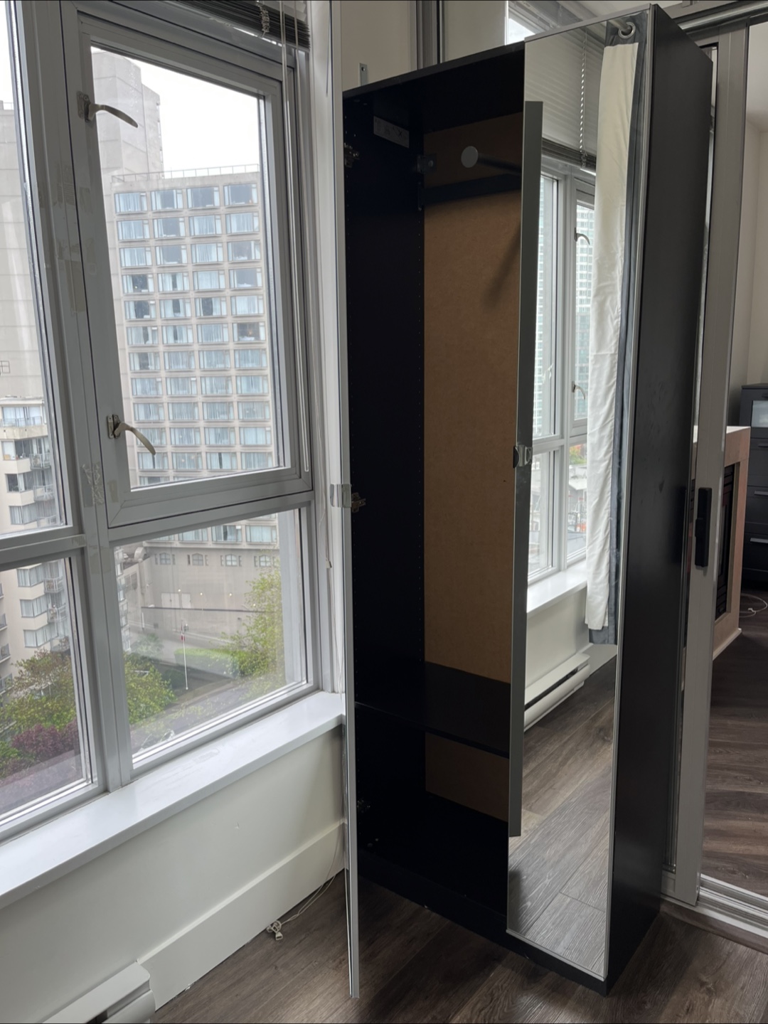 Closet with full-length mirror doors - photo 4