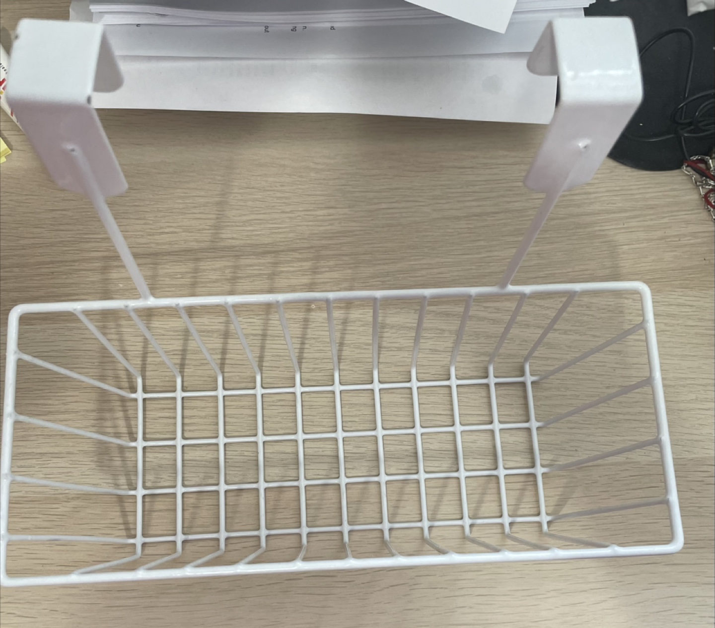Over-the-door organizer with basket and hooks
