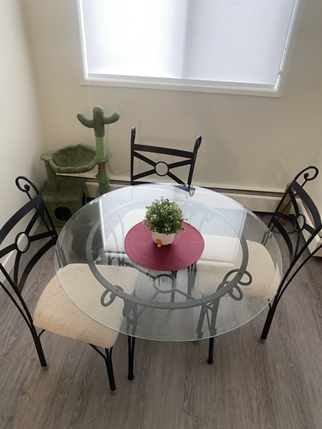 Moving sale- Glass-top dining table and three chairs set - photo 2