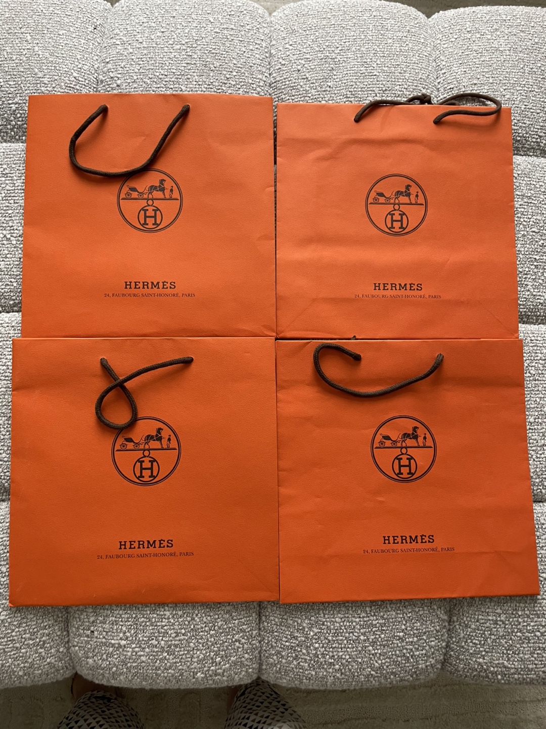 Four Hermès Orange Shopping Bags(square)