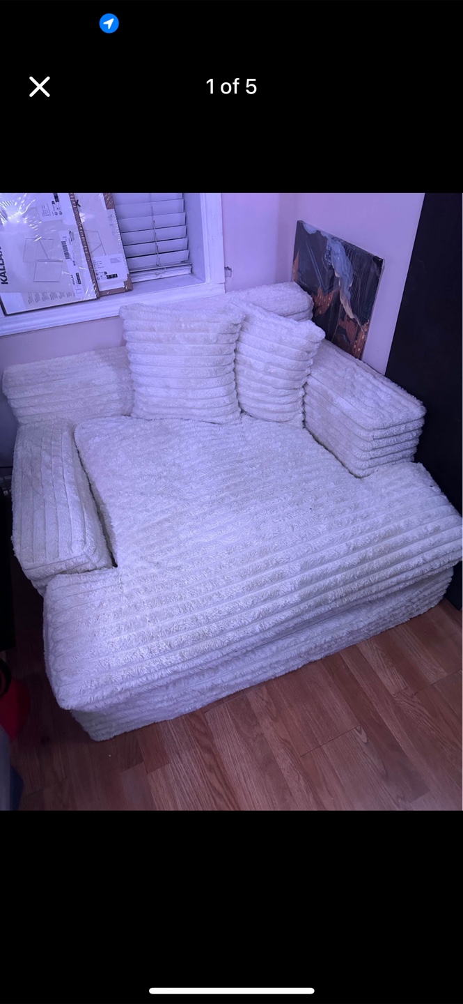 Cream-Colored Sofa with Pillows