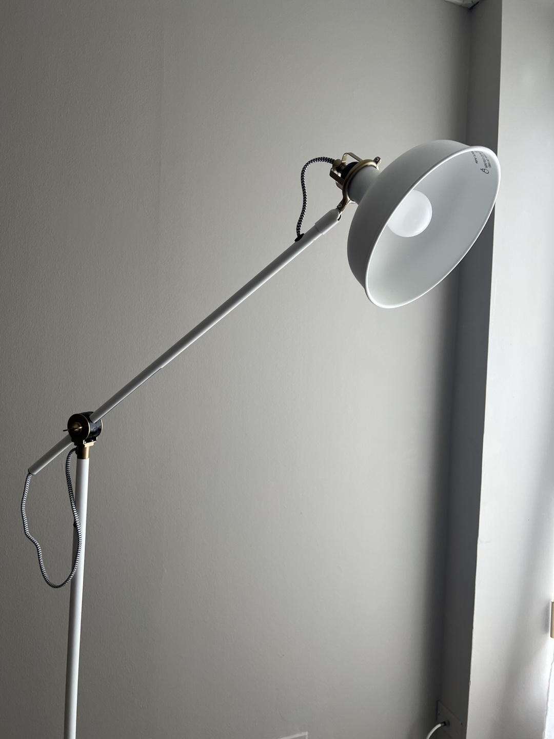 White & brass industrial aesthetic lamp
