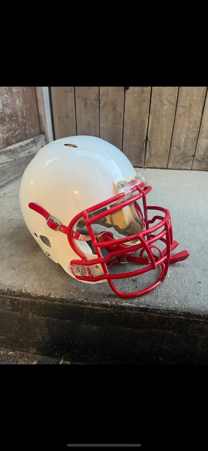 Riddell Youth Football Helmet and shoulder pads thumbnail