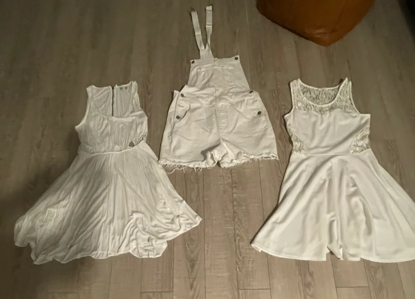 Short white jumpsuit and 2 white dresses image indicator(3)
