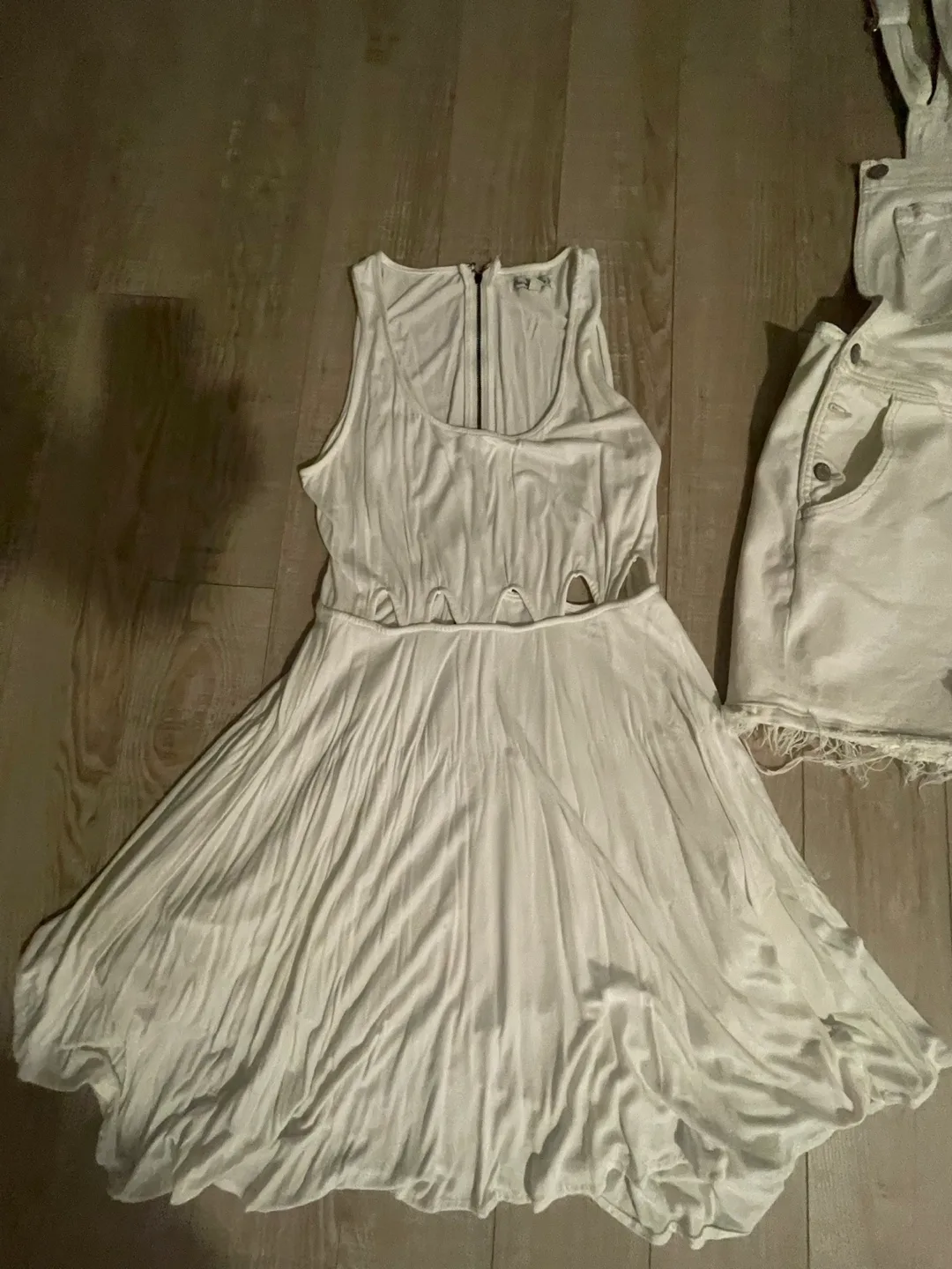 Short white jumpsuit and 2 white dresses image indicator(2)