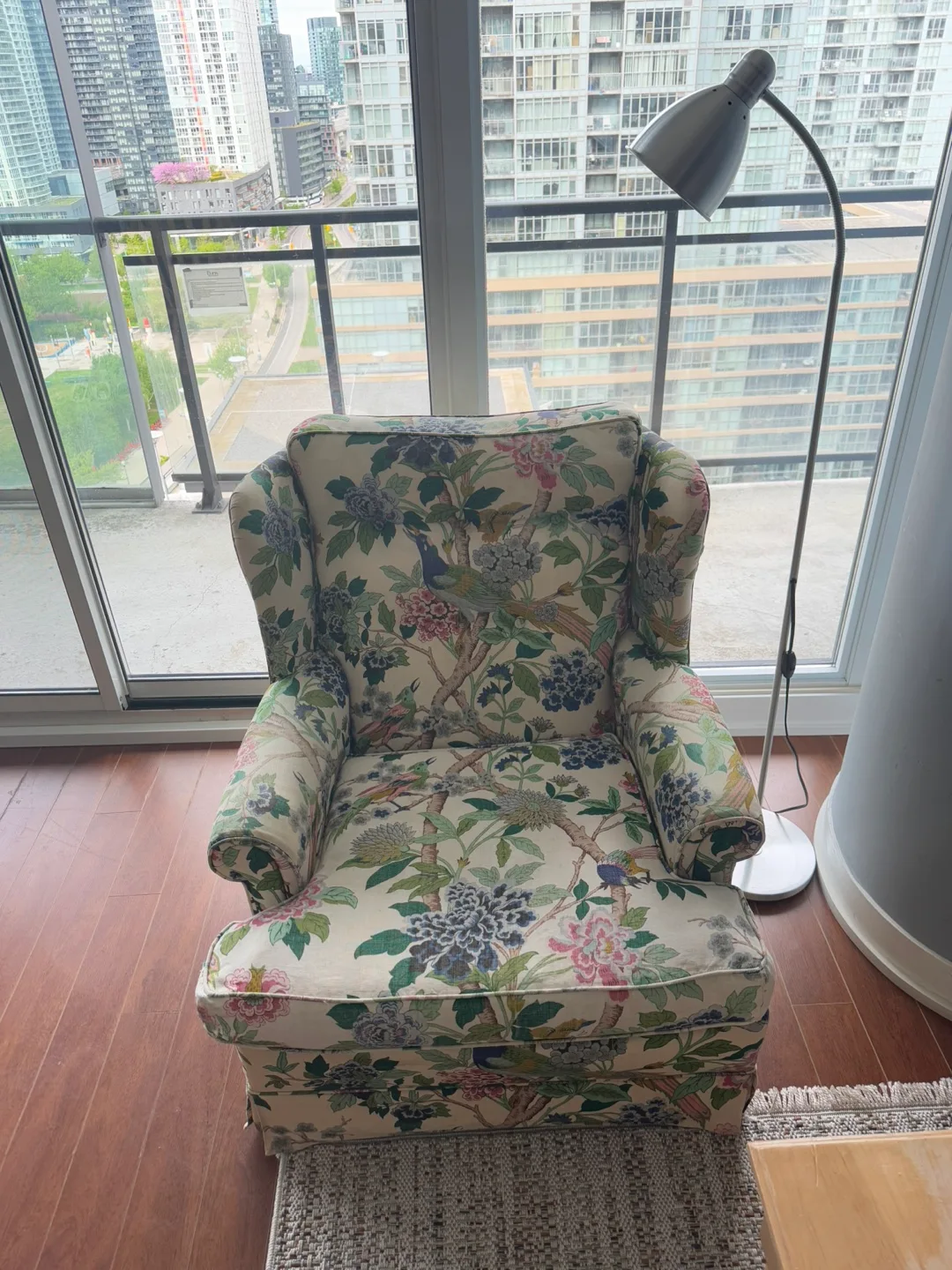 Wingback armchair with floral print