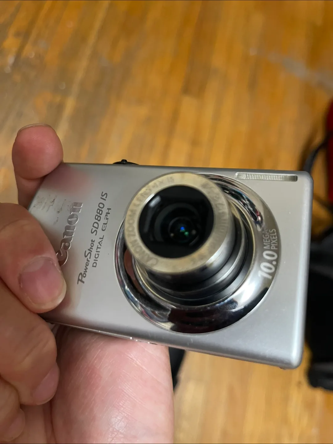 🏒 Canon PowerShot SD880 IS 10.0MP Digital Camera with Case image indicator(6)