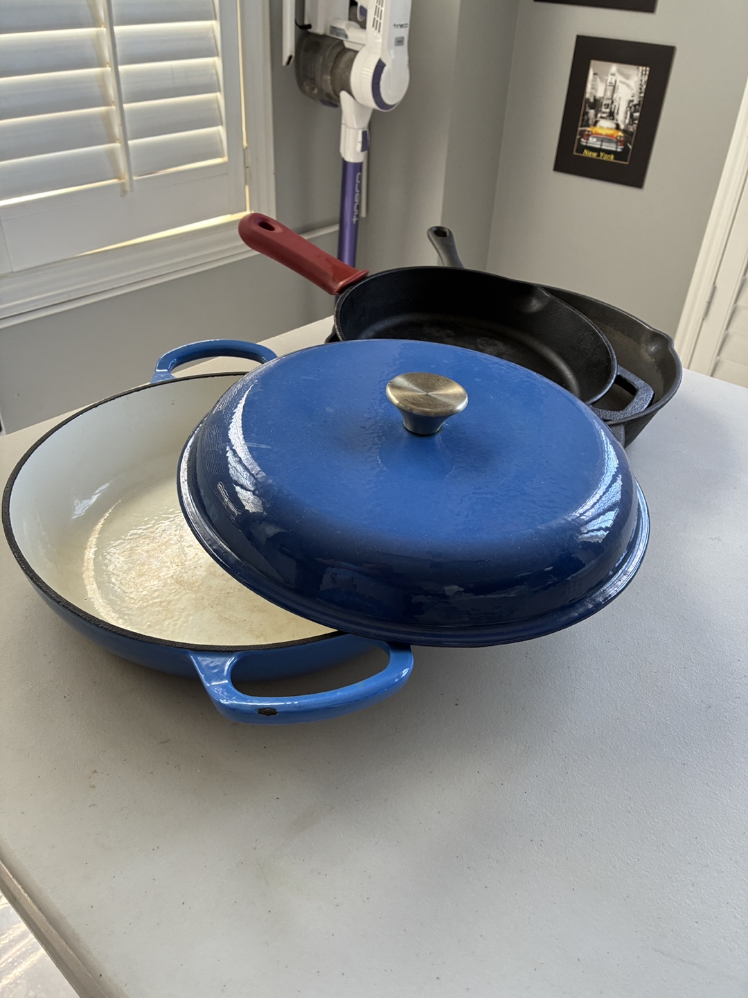 Blue Enamel Cast Iron Pot with Lid and Two Cast Iron Skillets