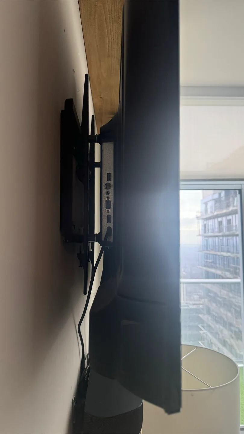 RCA TV with Roku Soundbar & Wall Mount image indicator(2)