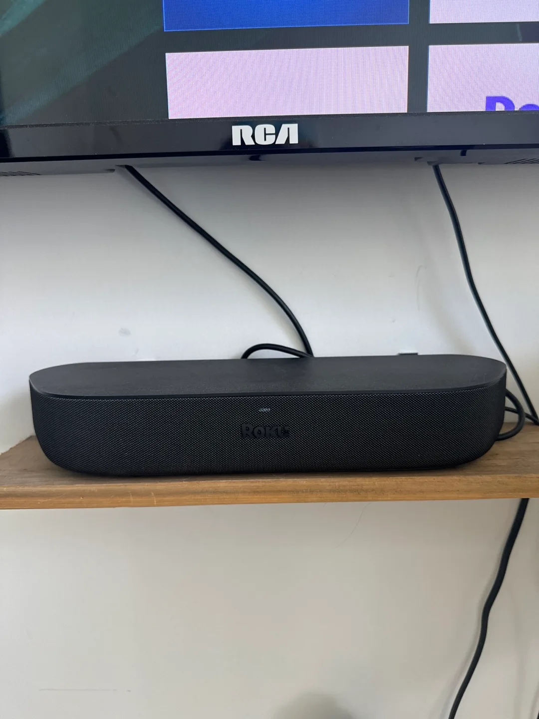 RCA TV with Roku Soundbar & Wall Mount image indicator(4)