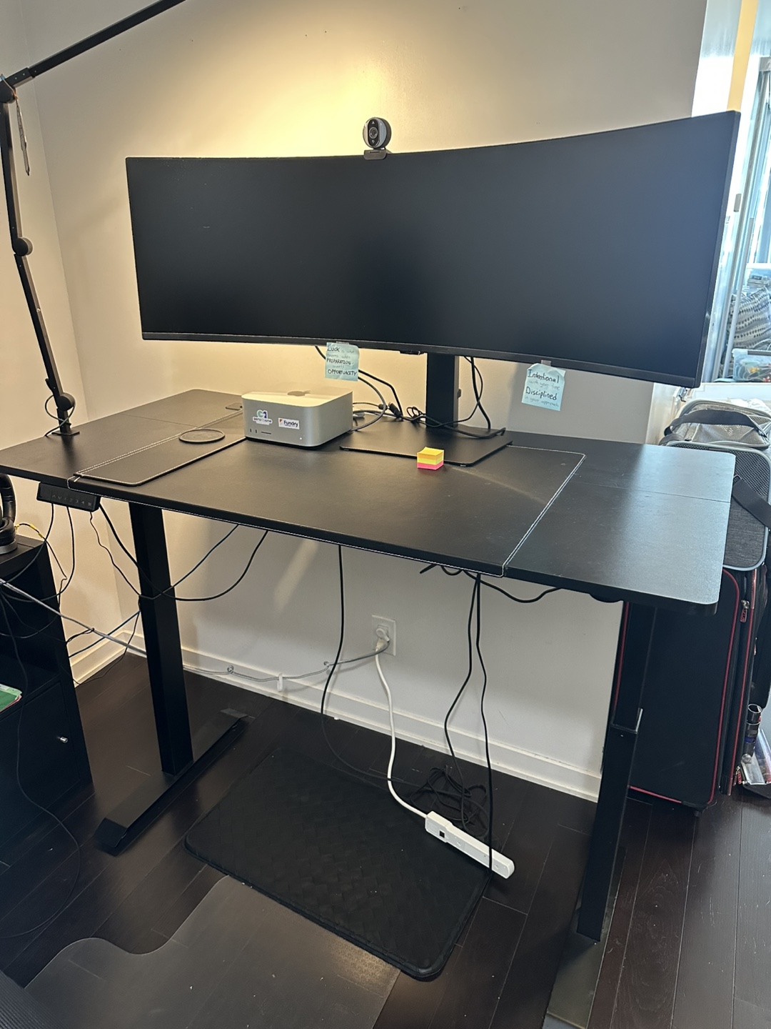 Black electric standing desk 55 x 28 in