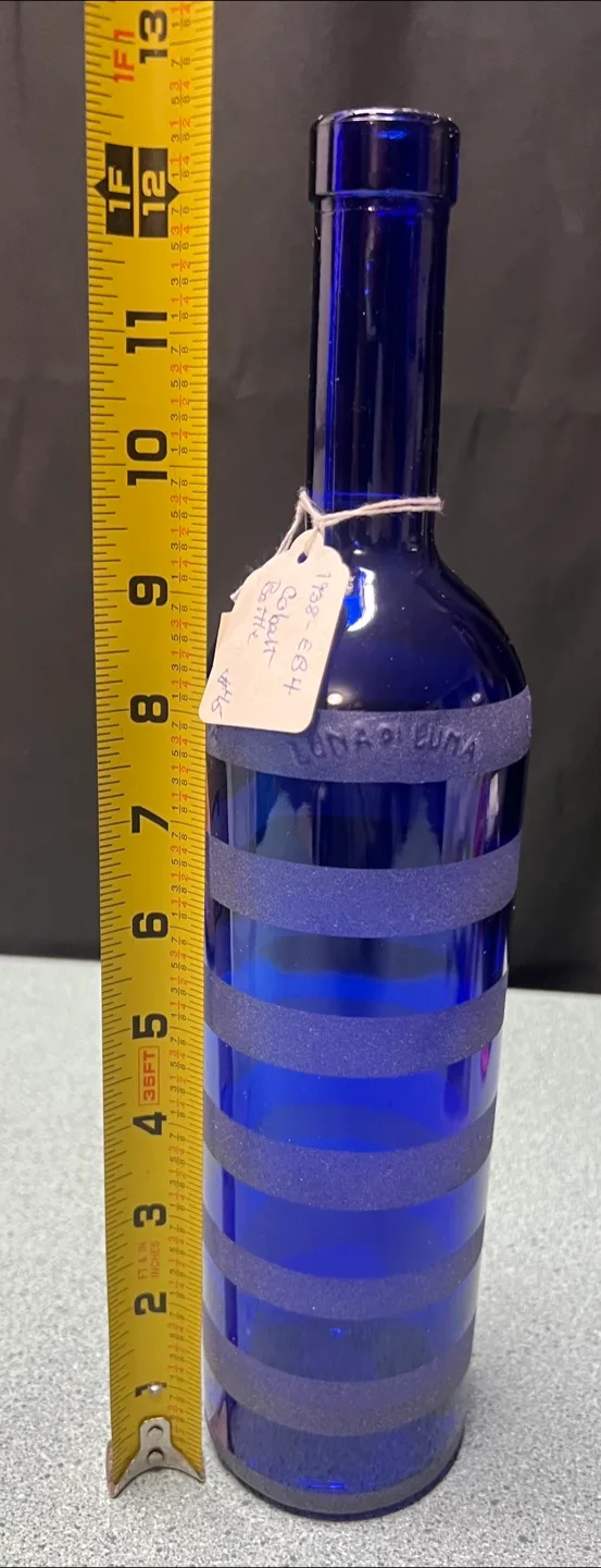 Vintage bottles, Luna a Luna cobalt blue and a clear bottle image indicator(2)